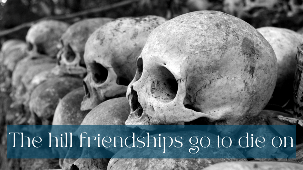 Neatly stacked skulls in black and white. White writing on half transparent teal background: The hill friendships go to die on