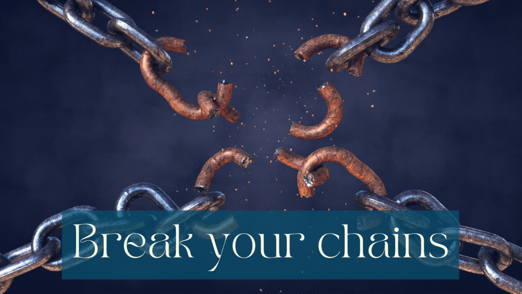 Black-grey “cloudy” looking background with crossed metal chains breaking in the middle of the picture. The links breaking are rusty. White writing on half transparent petrol coloured background at the bottom saying Break your chains.